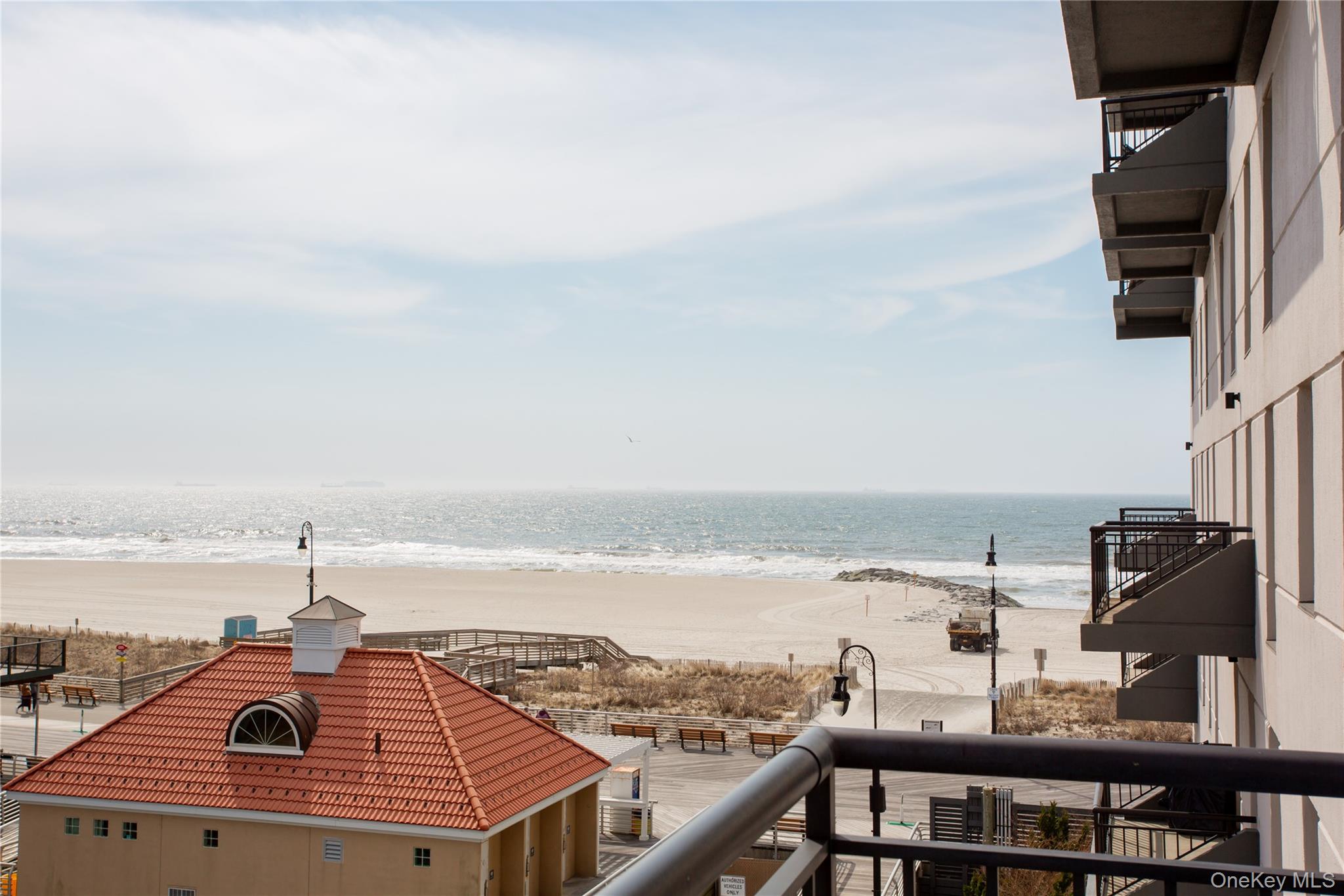 100 West Broadway, Unit 3D Long Beach, NY 11561 - Photo 19 of 50 a view of a balcony with an ocean view