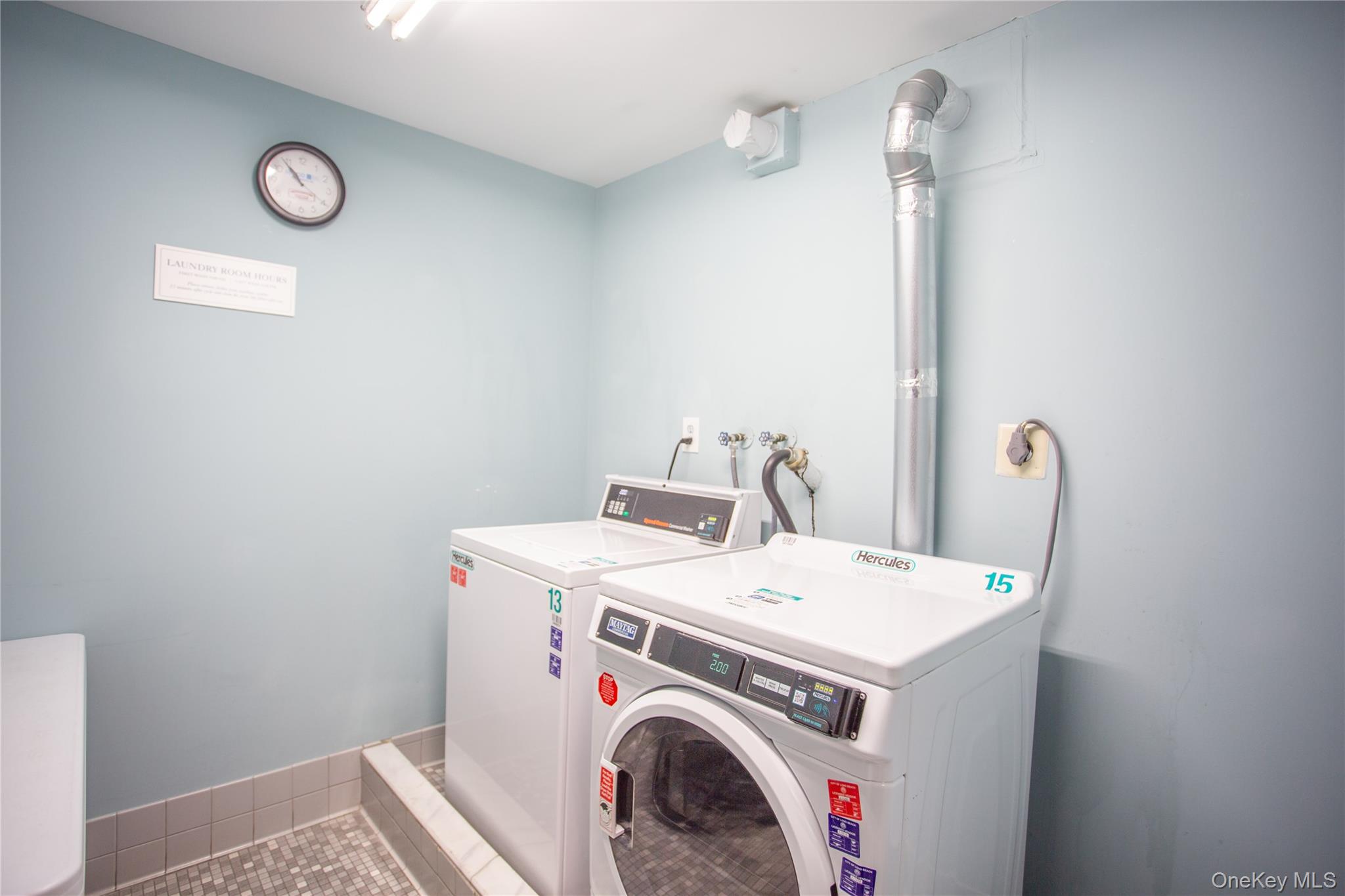 100 West Broadway, Unit 3D Long Beach, NY 11561 - Photo 30 of 50 a utility room with dryer and washer