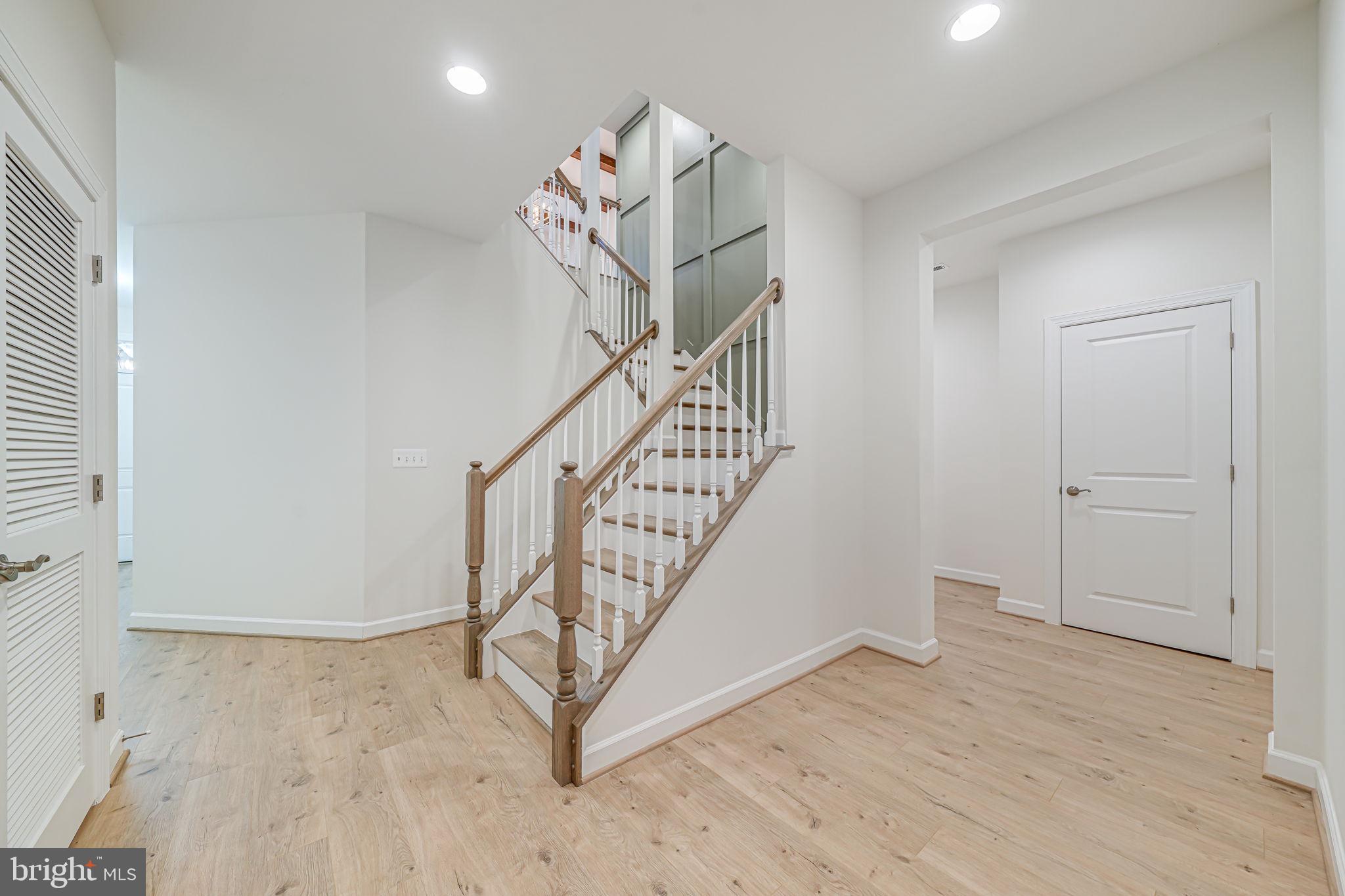7917 Turtle Creek Circle Gainesville, VA 20155 - Photo 11 of 41 a view of entryway and hall with wooden floor