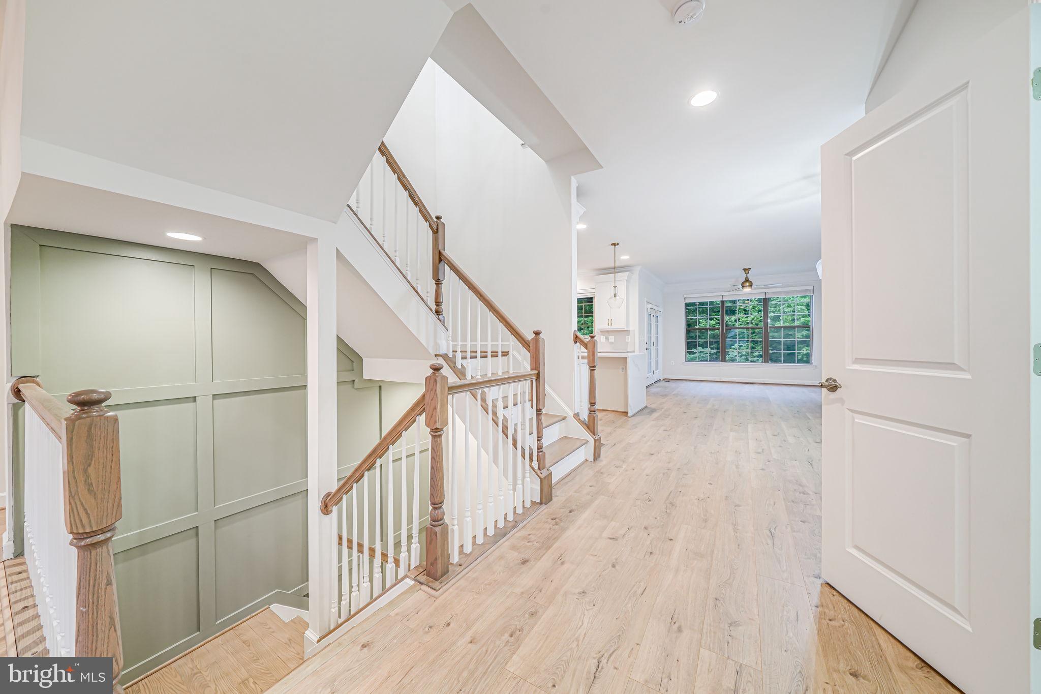 7917 Turtle Creek Circle Gainesville, VA 20155 - Photo 14 of 41 a view of an entryway with wooden floor