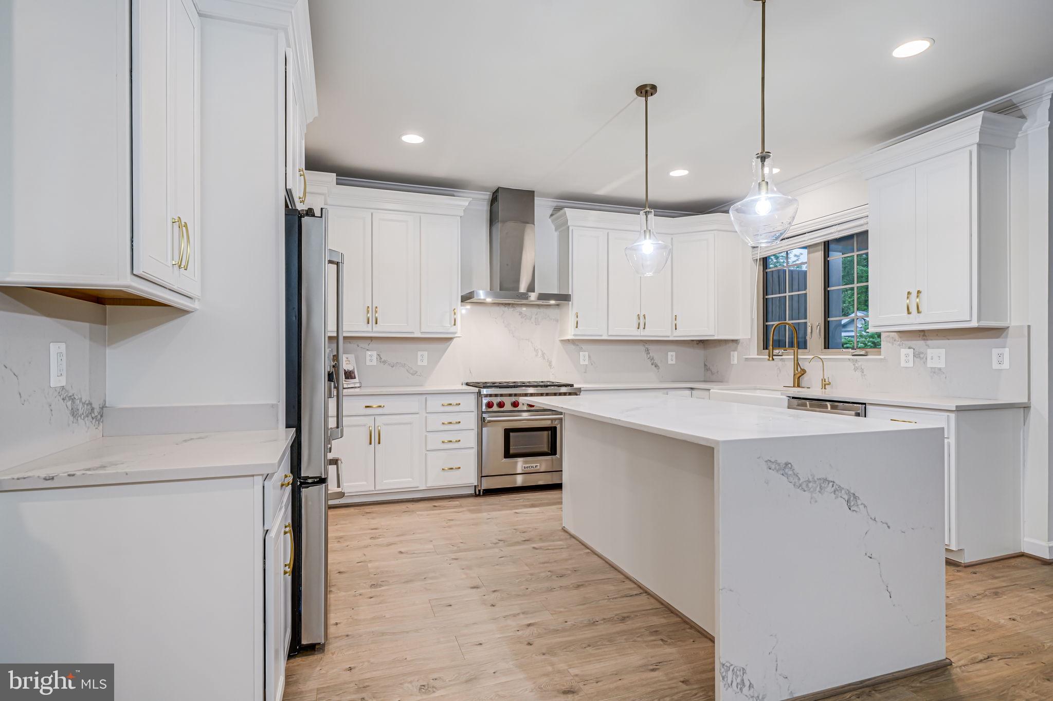 7917 Turtle Creek Circle Gainesville, VA 20155 - Photo 23 of 41 a kitchen with stainless steel appliances granite countertop a stove sink and refrigerator