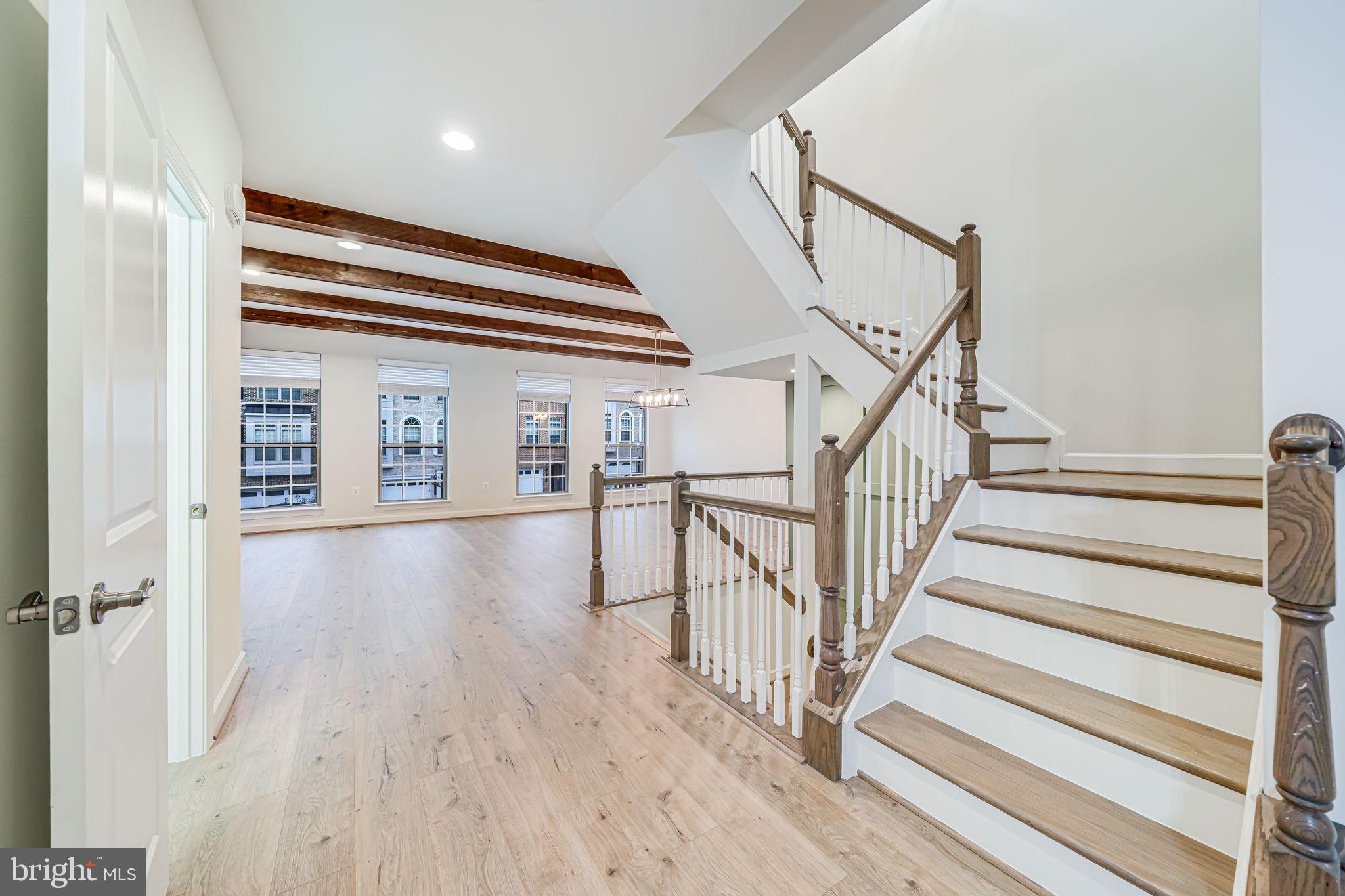 7917 Turtle Creek Circle Gainesville, VA 20155 - Photo 26 of 41 a view of staircase with white walls and a window