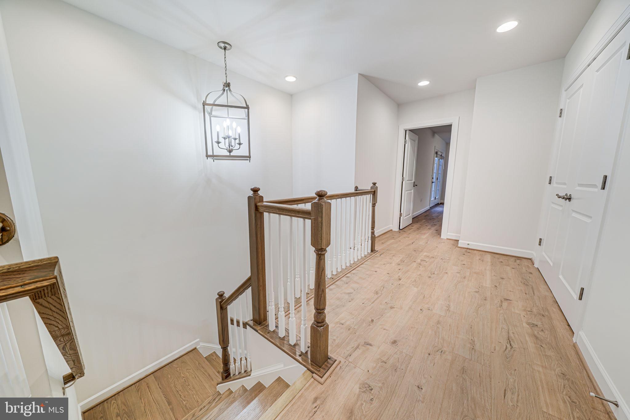 7917 Turtle Creek Circle Gainesville, VA 20155 - Photo 27 of 41 a view of entryway with wooden floor