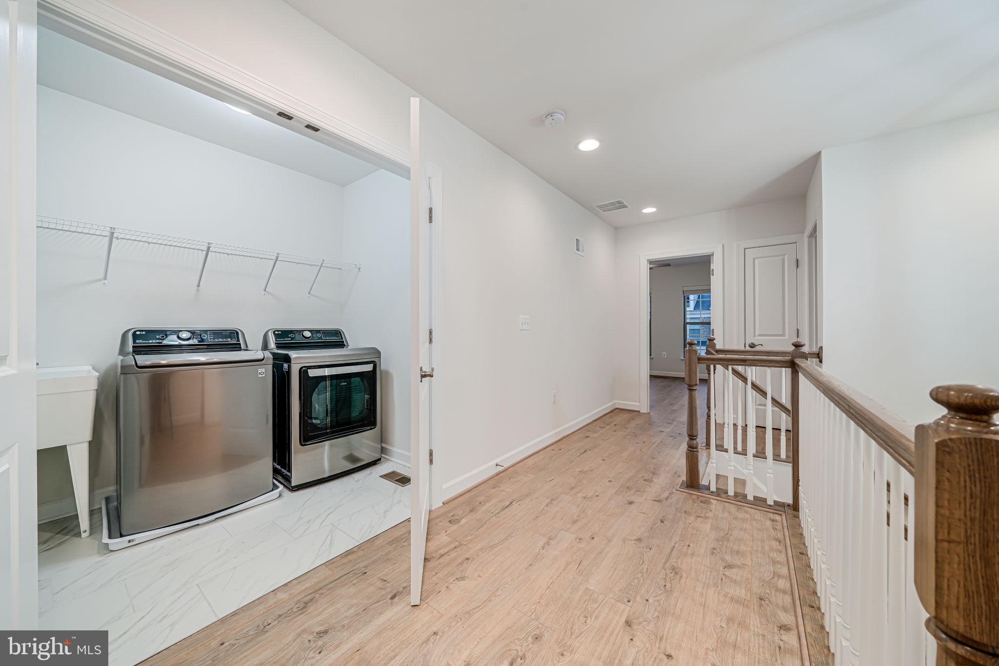 7917 Turtle Creek Circle Gainesville, VA 20155 - Photo 36 of 41 a view of a kitchen with a sink stove and cabinets