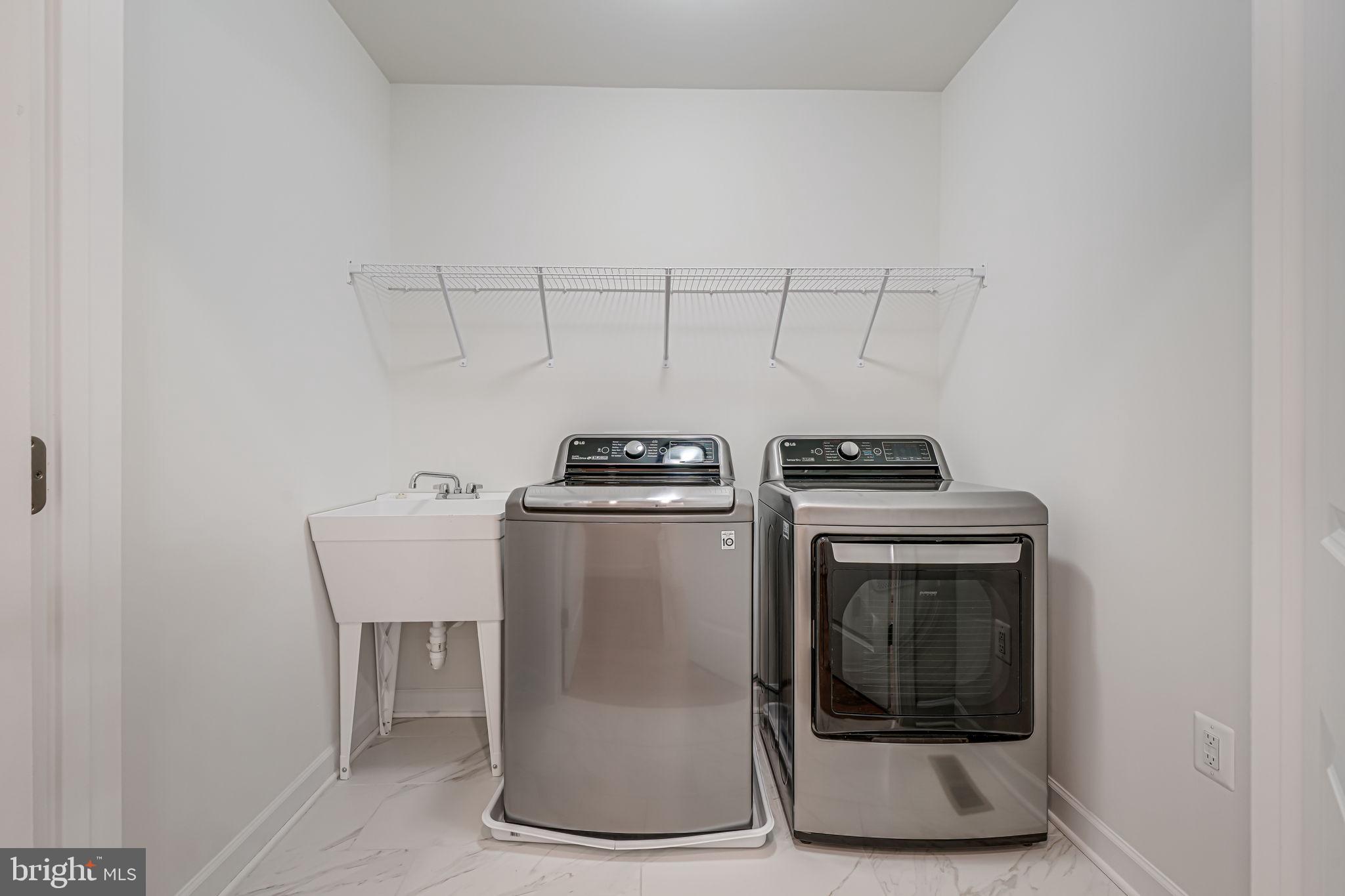 7917 Turtle Creek Circle Gainesville, VA 20155 - Photo 37 of 41 a utility room with washer and dryer