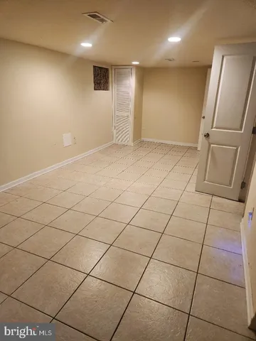 a view of a livingroom with kitchen and furniture