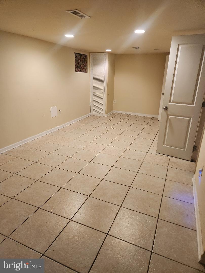 1011 Nova Avenue Capitol Heights, MD 20743 - Photo 15 of 15 a view of a livingroom with kitchen and furniture