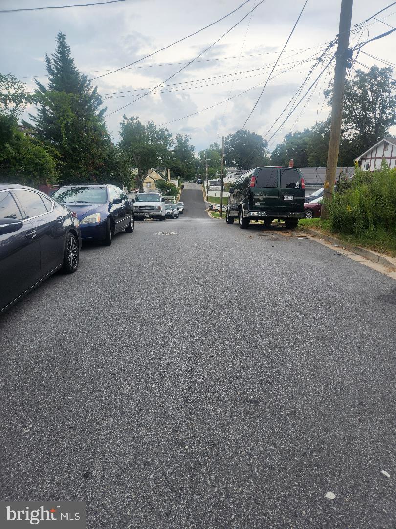 1011 Nova Avenue Capitol Heights, MD 20743 - Photo 2 of 15 a view of street with parked cars