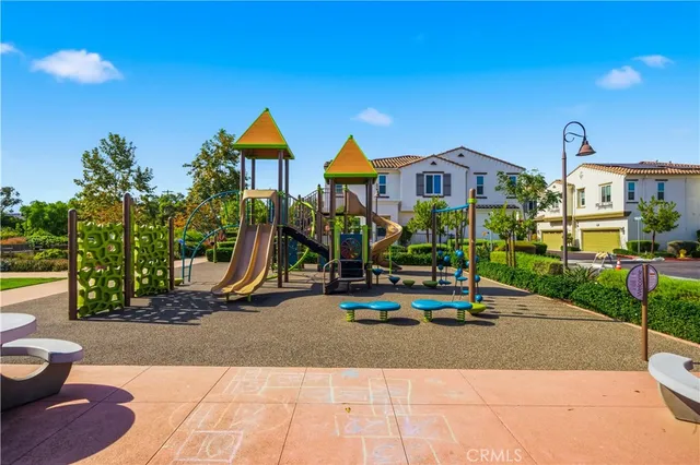 a view of park with large trees