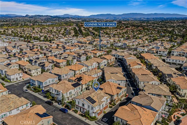 an aerial view of residential building with outdoor space
