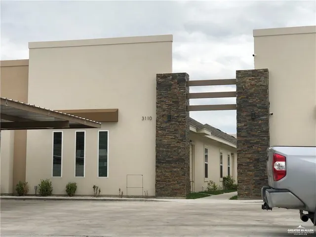 a house with a potted plant