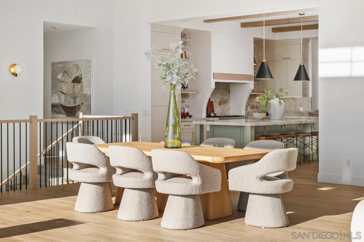 6691 Camino Saucito Rancho Santa Fe, CA 92067 - Photo 15 of 54 a dining room with furniture and window