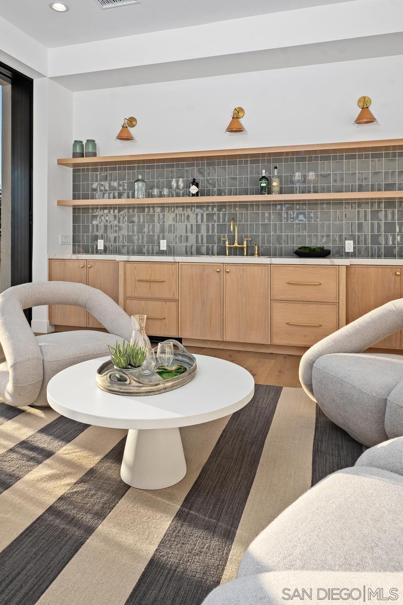 6691 Camino Saucito Rancho Santa Fe, CA 92067 - Photo 31 of 54 a living room with furniture