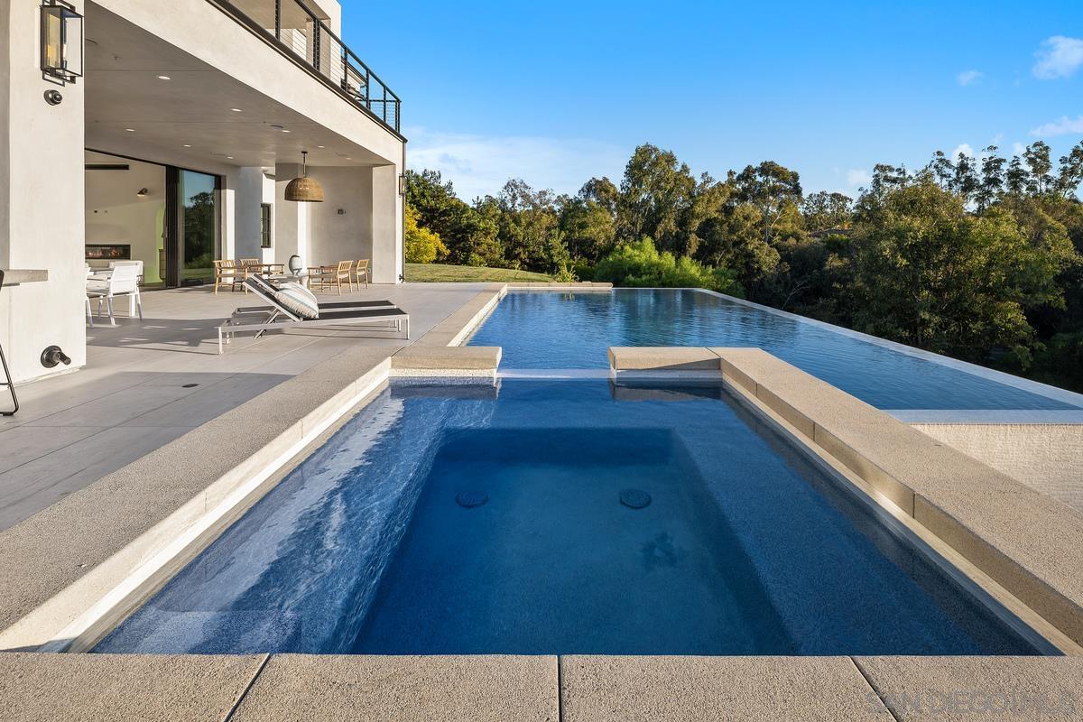 6691 Camino Saucito Rancho Santa Fe, CA 92067 - Photo 33 of 54 a view of swimming pool with outdoor seating