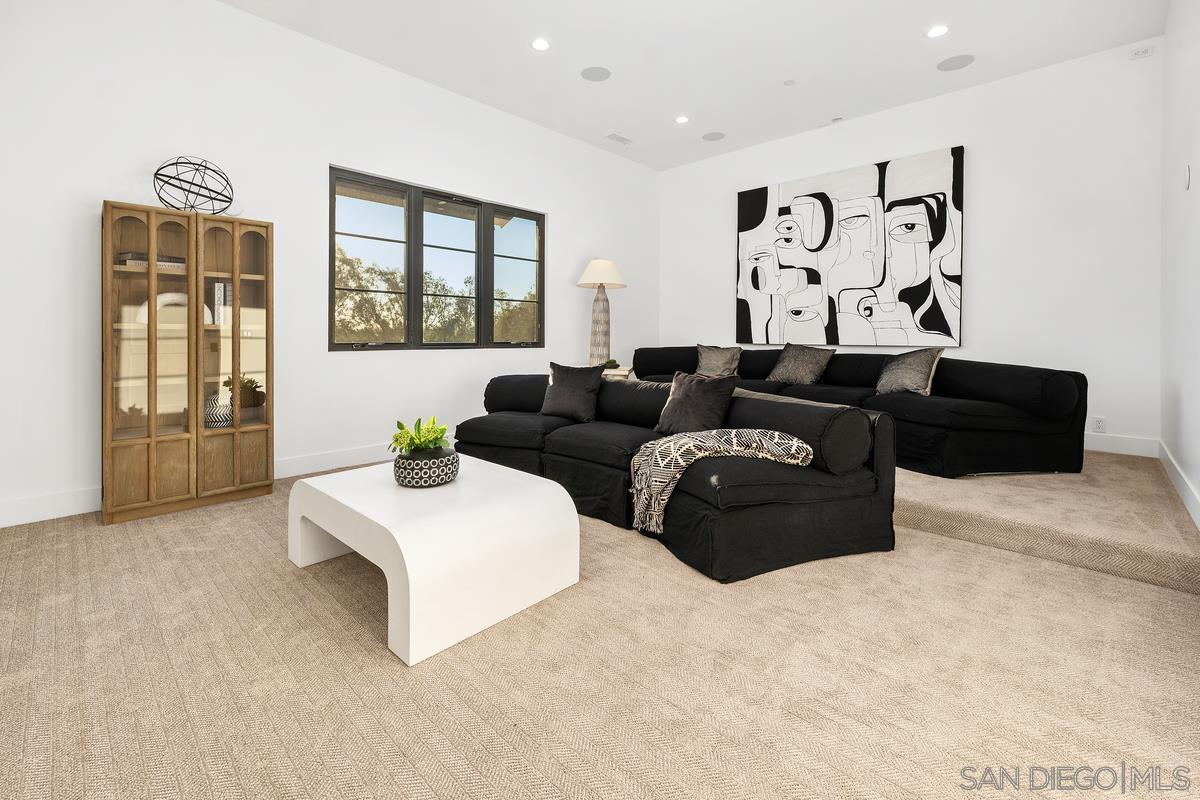 6691 Camino Saucito Rancho Santa Fe, CA 92067 - Photo 43 of 54 a living room with furniture and a large window