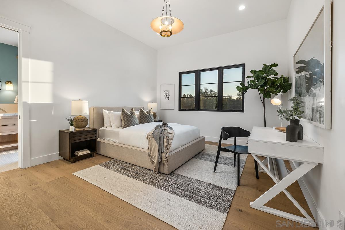 6691 Camino Saucito Rancho Santa Fe, CA 92067 - Photo 47 of 55 a bedroom with a bed and a table