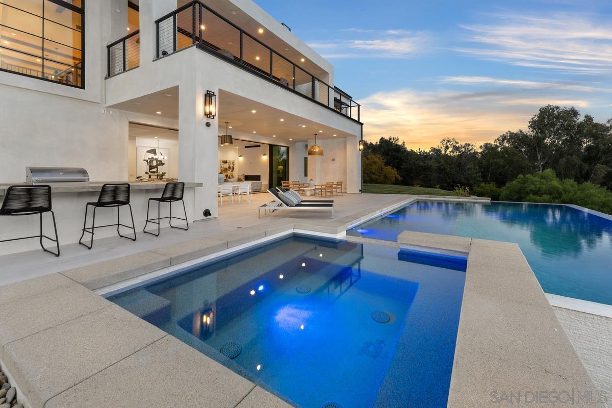 6691 Camino Saucito Rancho Santa Fe, CA 92067 - Photo 53 of 54 a view of a swimming pool with outdoor seating