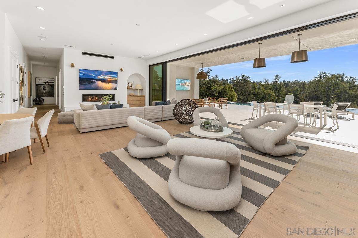 6691 Camino Saucito Rancho Santa Fe, CA 92067 - Photo 10 of 55 a living room with furniture and a large window