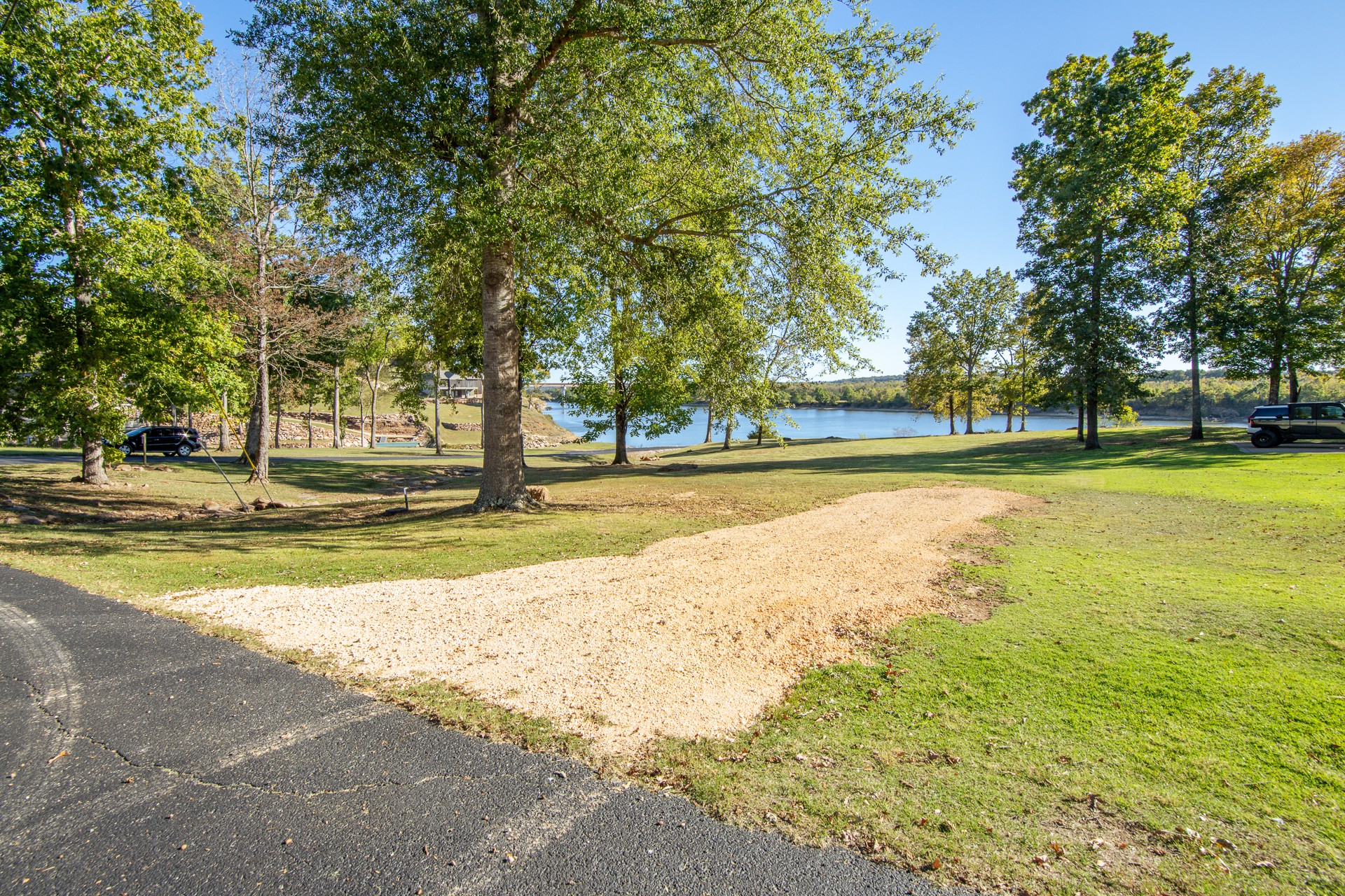 21 Rivers Edge Cove Bath Springs, TN 38311 - Photo 10 of 41 a view of a swimming pool with an outdoor space and seating area