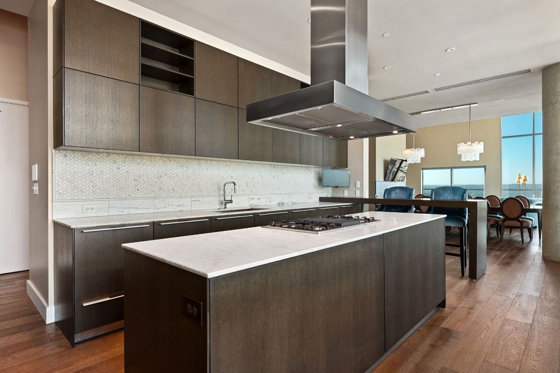 210 Lavaca Street, Unit 3503 Austin, TX 78701 - Photo 17 of 40 a kitchen with a stove and a refrigerator