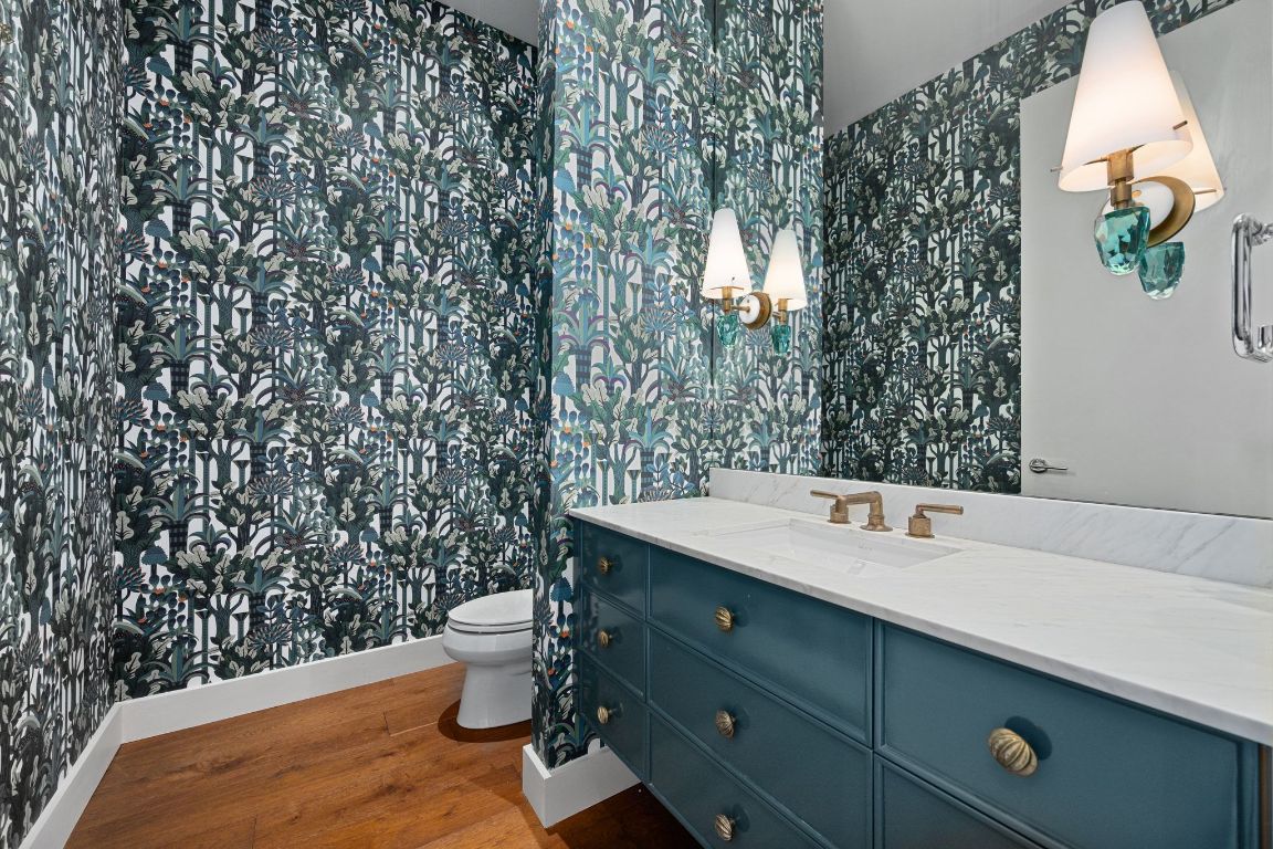 210 Lavaca Street, Unit 3503 Austin, TX 78701 - Photo 31 of 40 a bathroom with a sink mirror and toilet