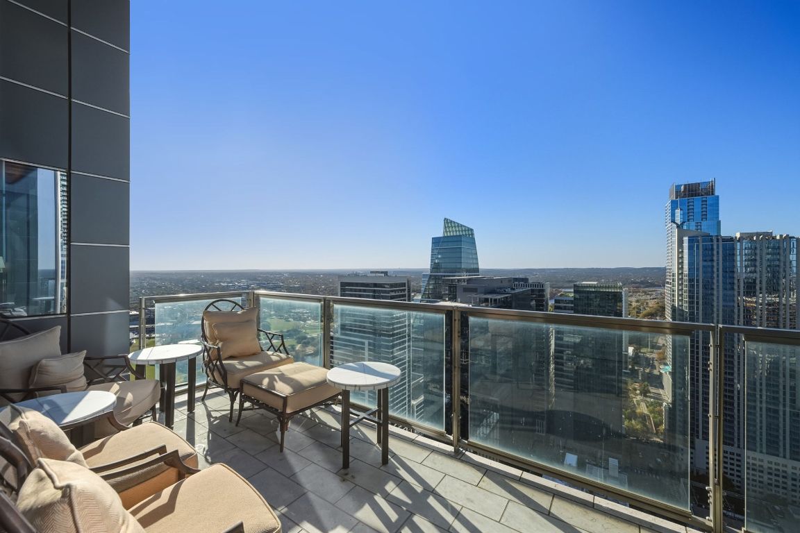 210 Lavaca Street, Unit 3503 Austin, TX 78701 - Photo 32 of 40 a terrace with a table and chairs