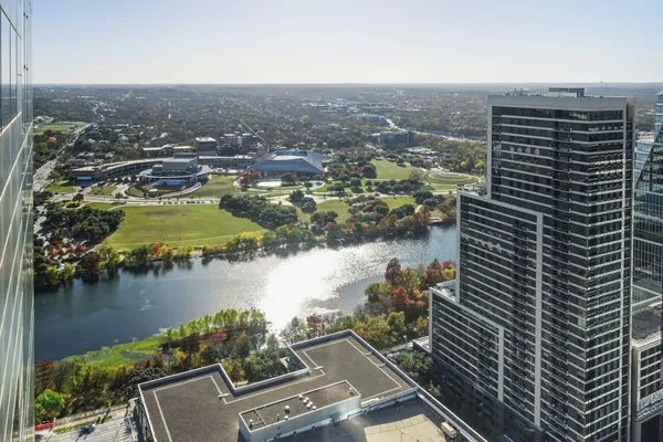a view of a lake with a city