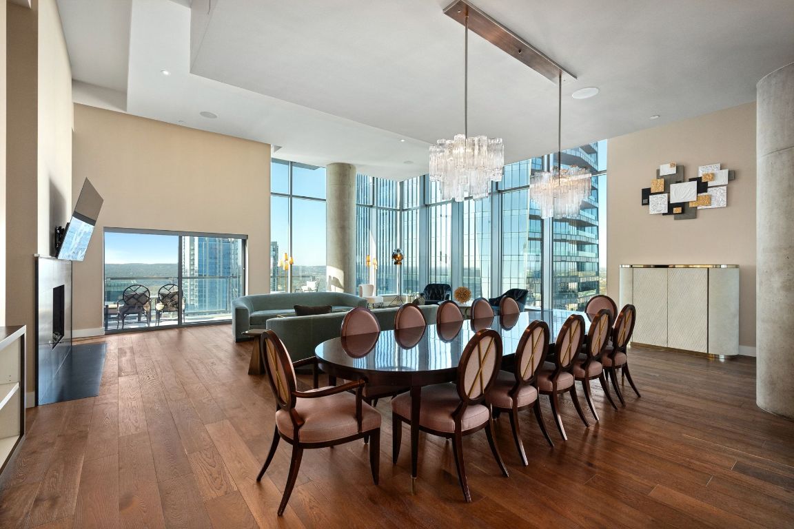 210 Lavaca Street, Unit 3503 Austin, TX 78701 - Photo 4 of 40 a view of a dining room with furniture window and wooden floor