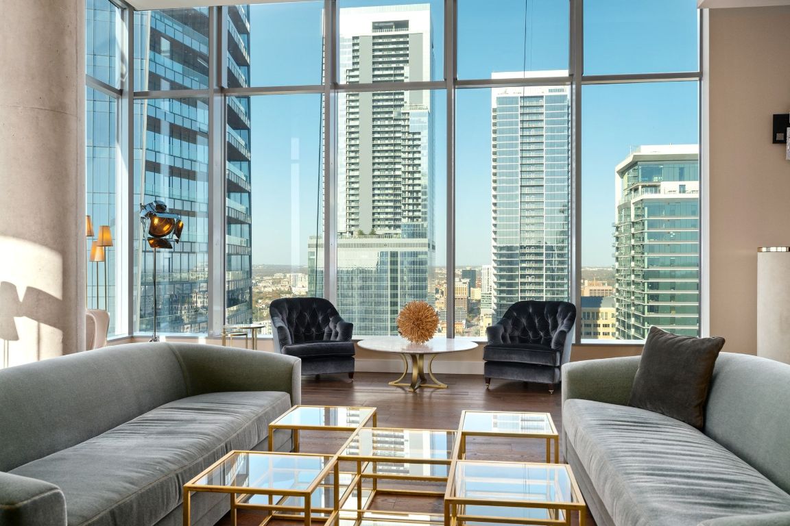 210 Lavaca Street, Unit 3503 Austin, TX 78701 - Photo 6 of 40 a living room with furniture and a large window