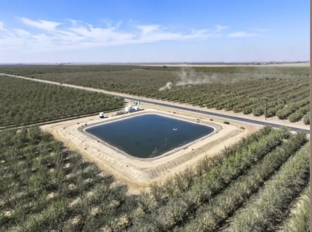 a view of a lake with a yard