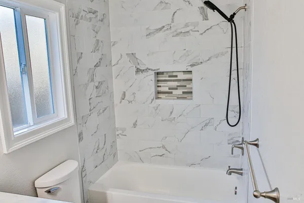 a bathroom with a bathtub