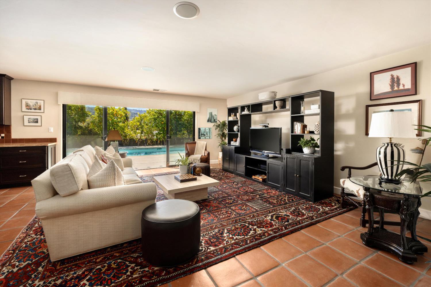1213 San Ramon Way Ojai, CA 93023 - Photo 6 of 35 a living room with furniture and a flat screen tv