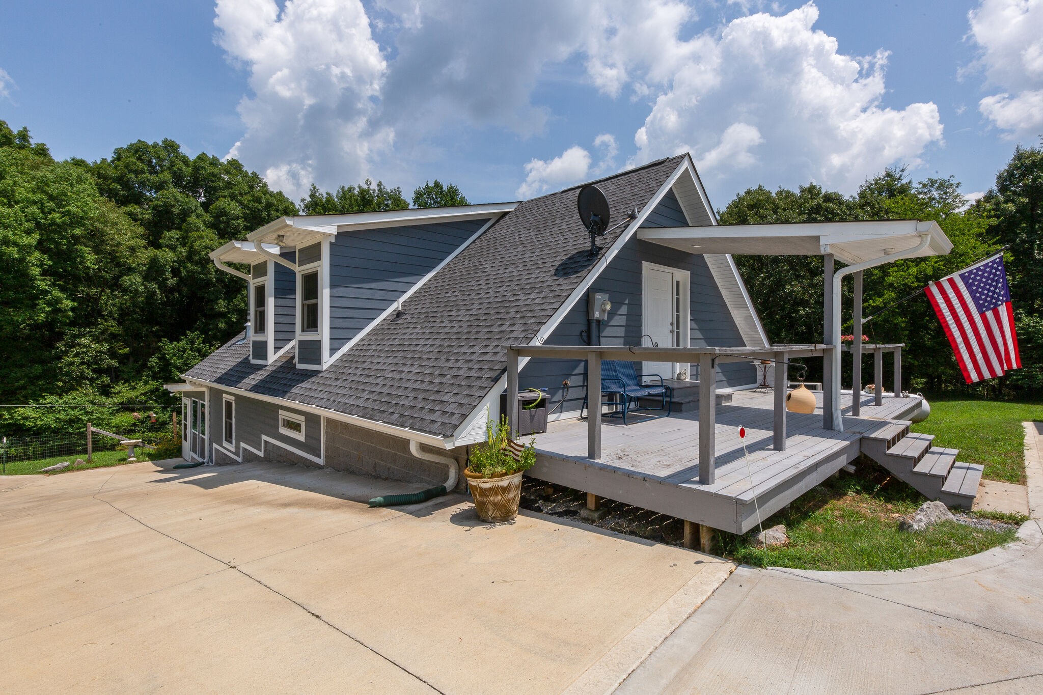 9953 Spring Creek Road Bon Aqua, TN 37025 - Photo 14 of 26 a view of house with outdoor space and entertaining space