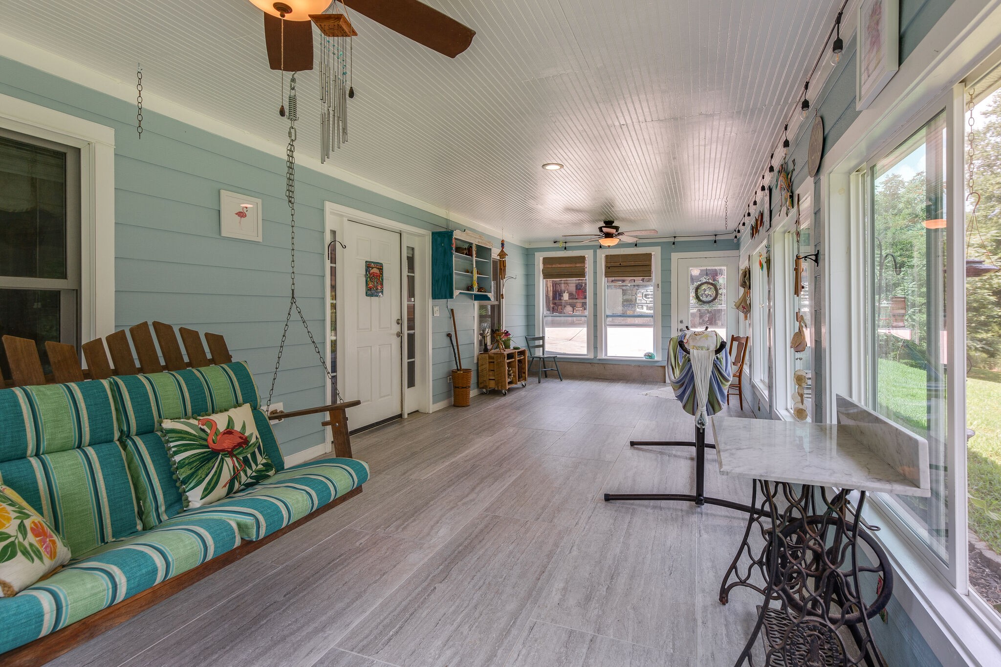 9953 Spring Creek Road Bon Aqua, TN 37025 - Photo 9 of 26 a living room with furniture and a floor to ceiling window