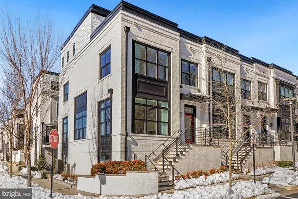 a front view of a building and a terrace view