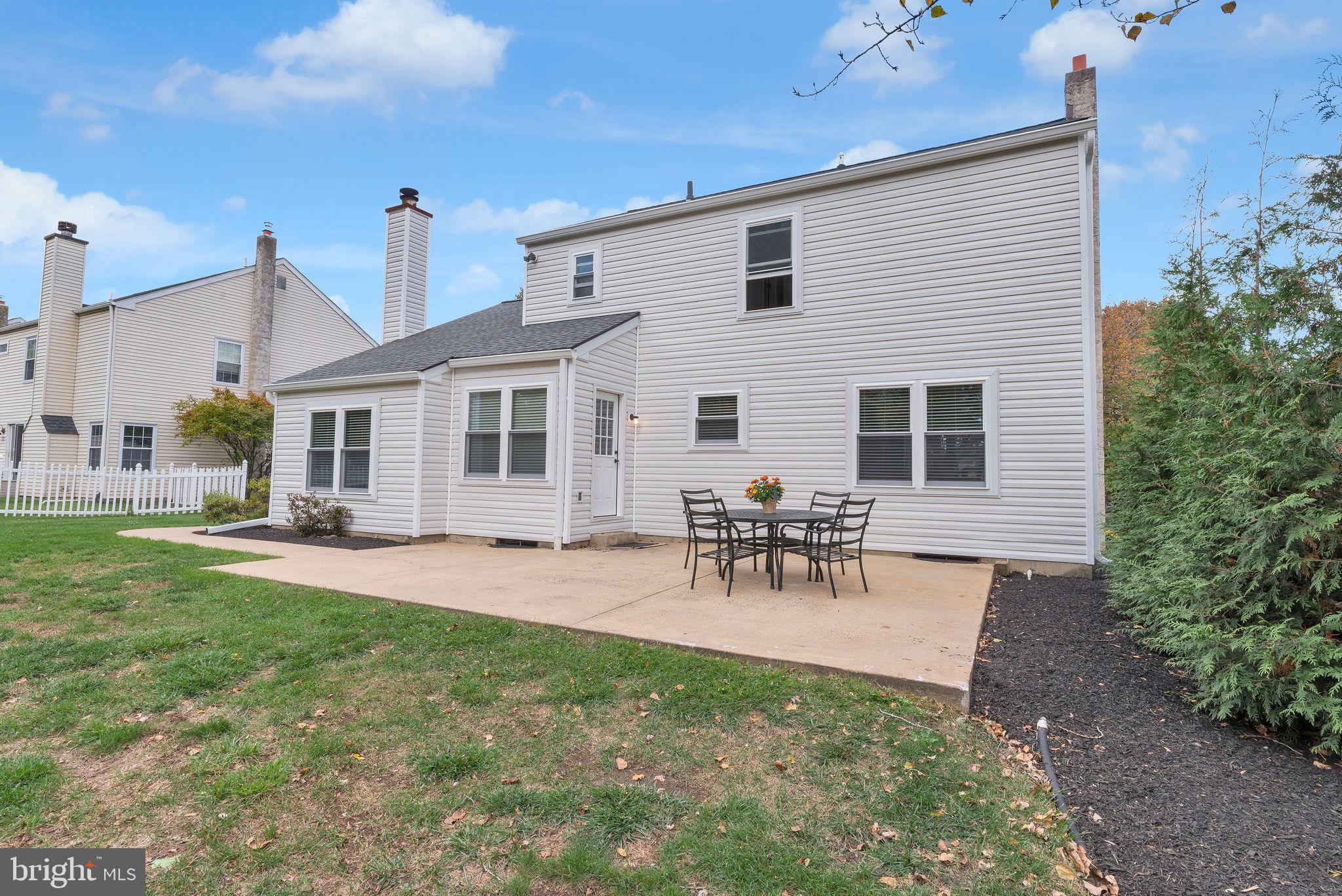 2158 Green Ridge Drive Warrington, PA 18976 - Photo 29 of 34 a view of a house with patio and a garden