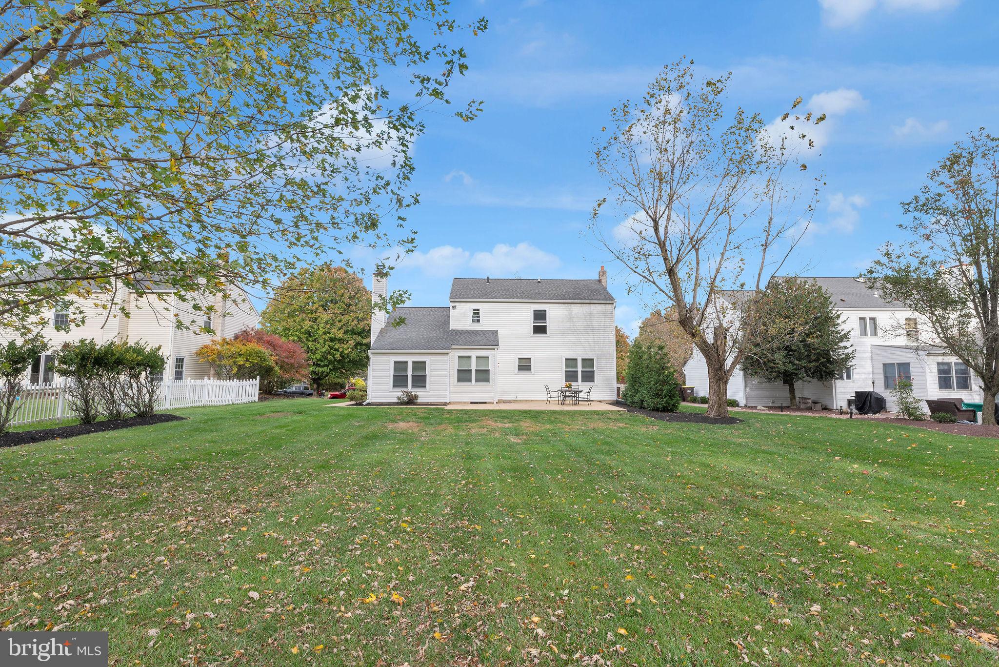 2158 Green Ridge Drive Warrington, PA 18976 - Photo 33 of 34 a view of a house with a big yard and large trees