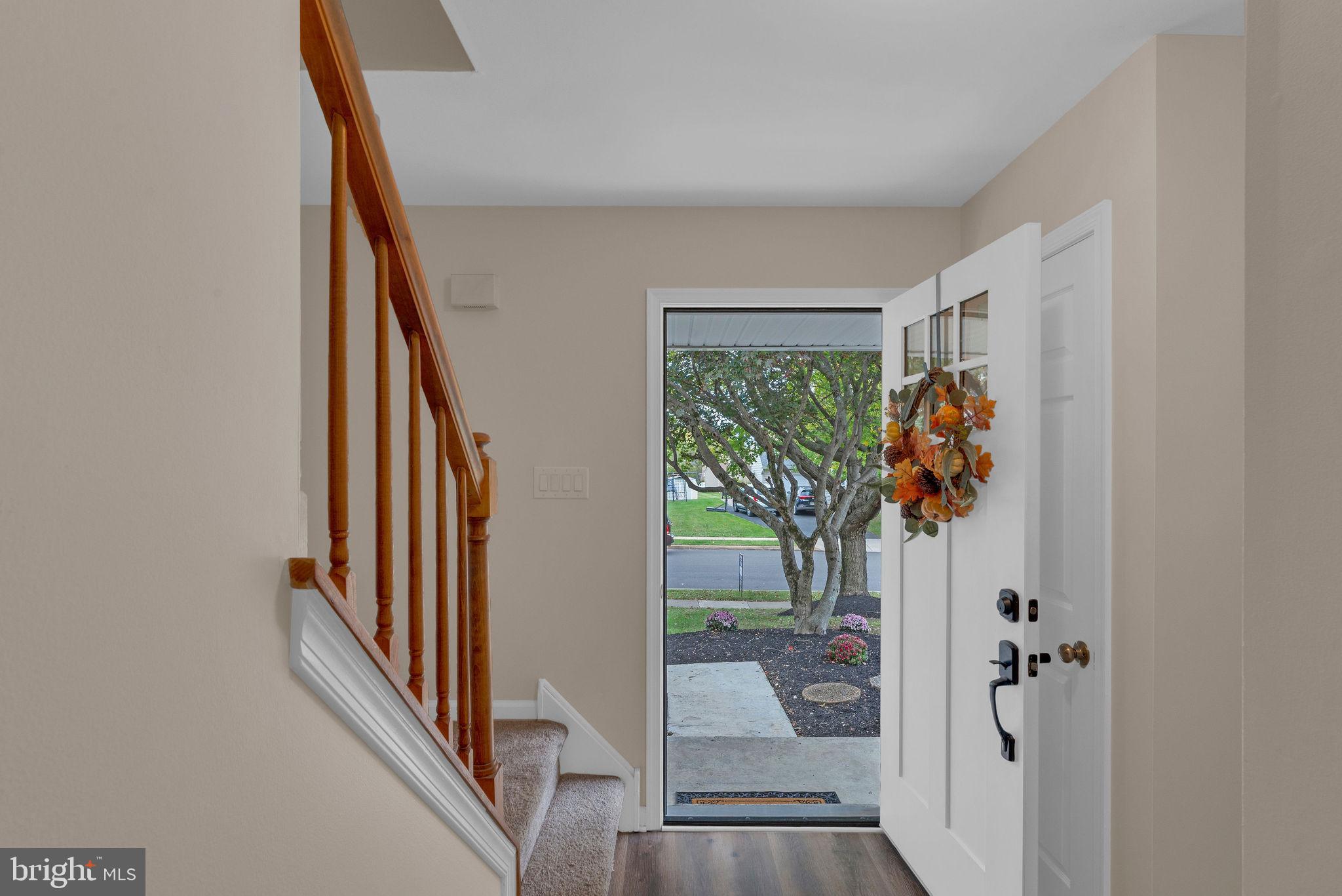 2158 Green Ridge Drive Warrington, PA 18976 - Photo 7 of 34 an entryway with a flower pot and a window