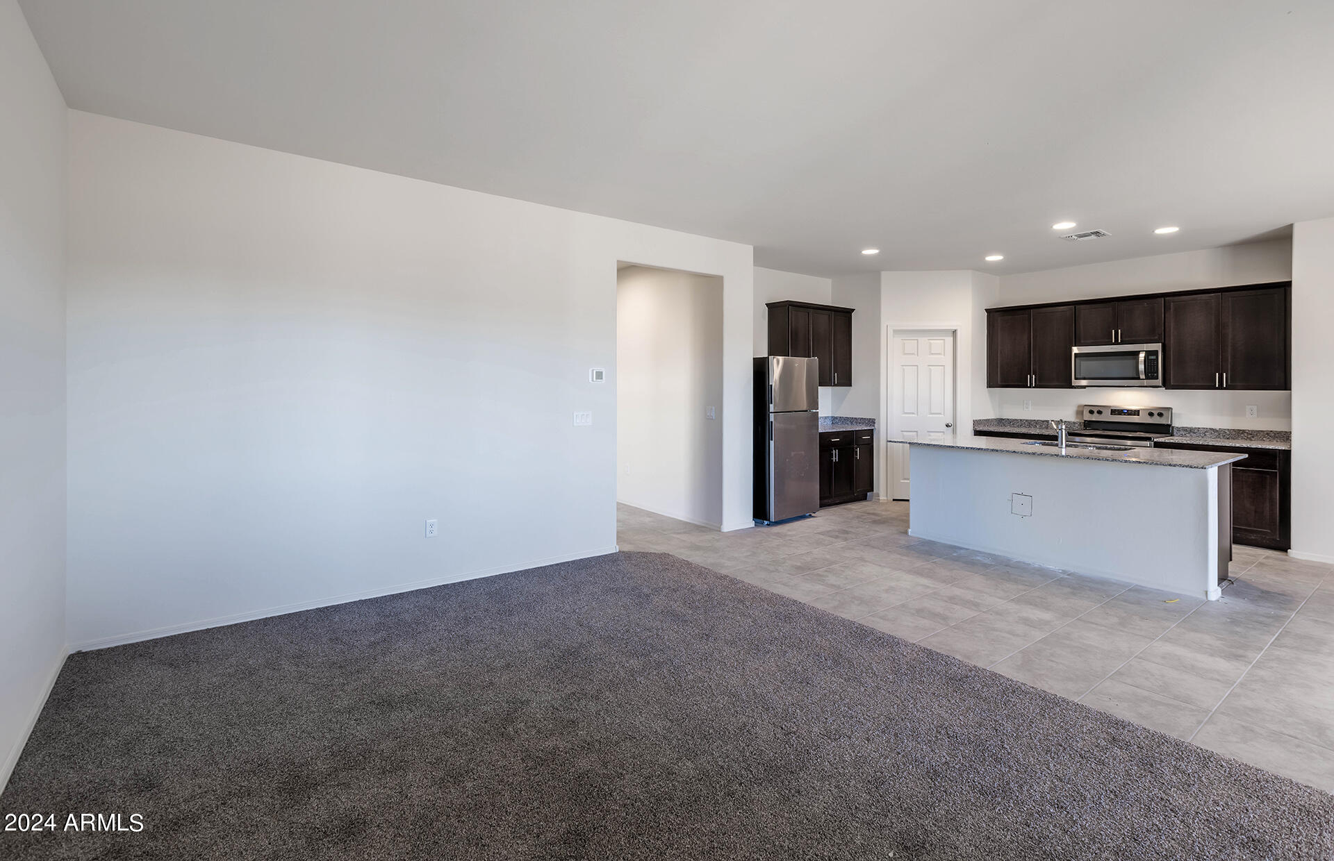 24379 West Ripple Road Buckeye, AZ 85326 - Photo 14 of 30 12 - Gatherng Room and Kitchen
