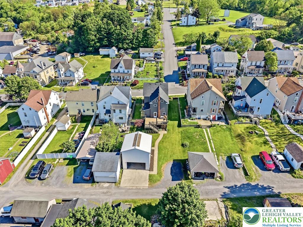 3453 Main Street Slatington, PA 18080 - Photo 25 of 30 An aerial perspective reveals a quaint neighborhood with residential homes nestled amidst verdant hillsides.