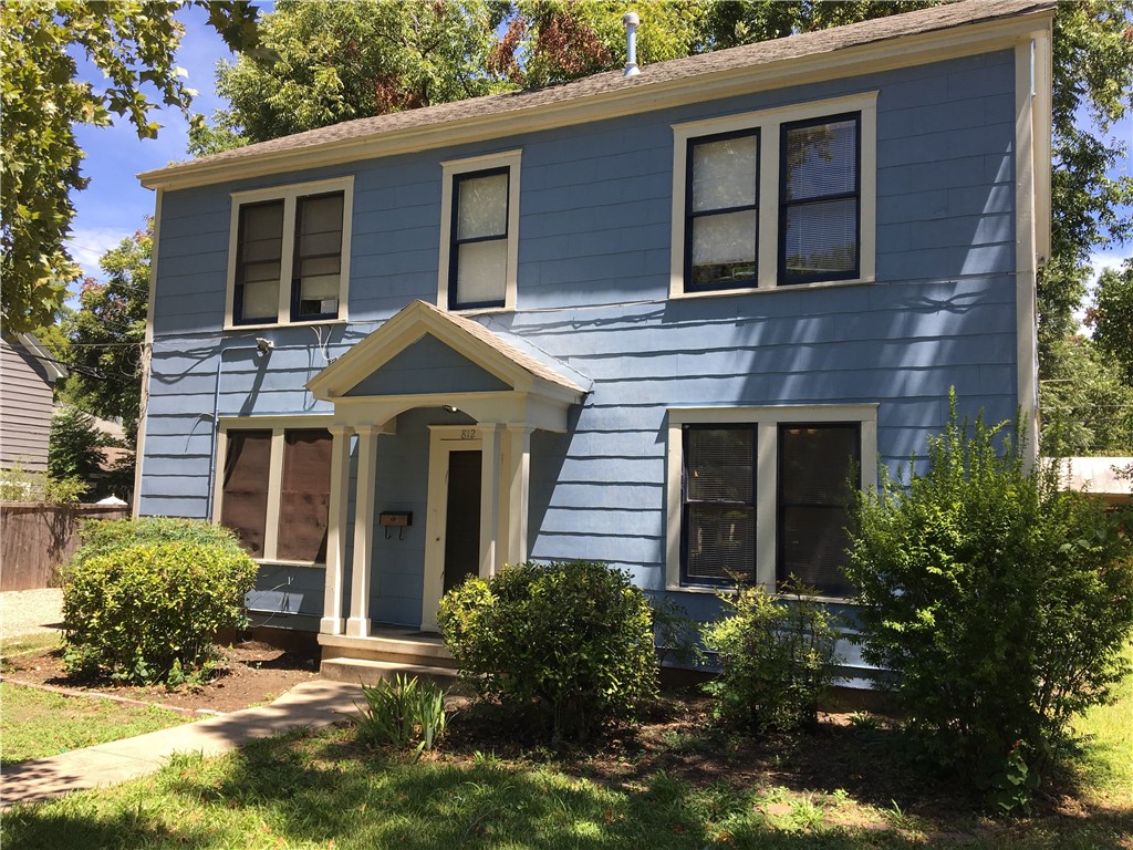 812 East 30th Street, Unit 2 Austin, TX 78705 - Photo 1 of 16 a front view of a house with yard and trees