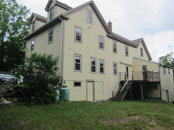 58 South Main Street Ashburnham, MA 01430 - Photo 4 of 20 a view of a house with backyard and garden