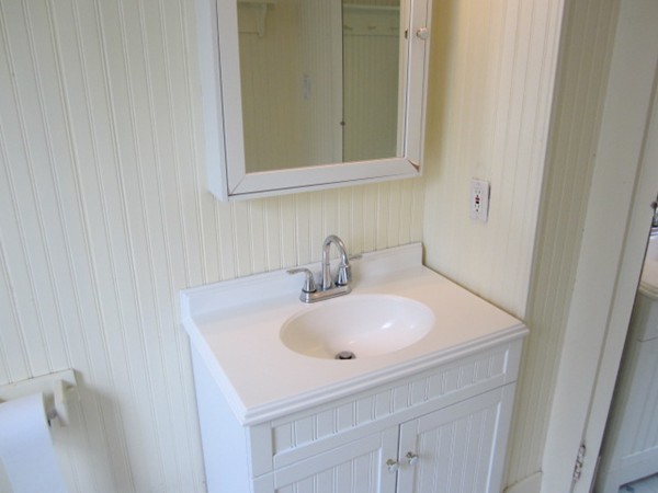 58 South Main Street Ashburnham, MA 01430 - Photo 9 of 20 a bathroom with a sink and a mirror