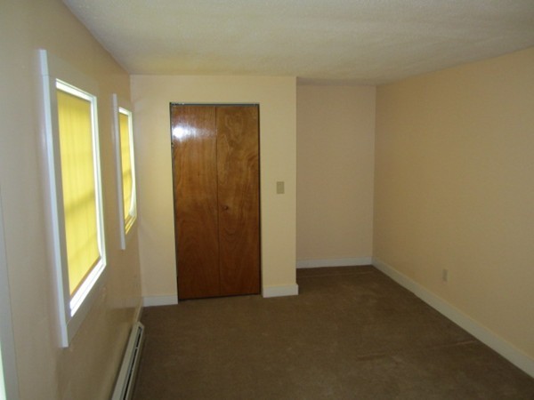 58 South Main Street Ashburnham, MA 01430 - Photo 10 of 20 a view of an empty room with a window