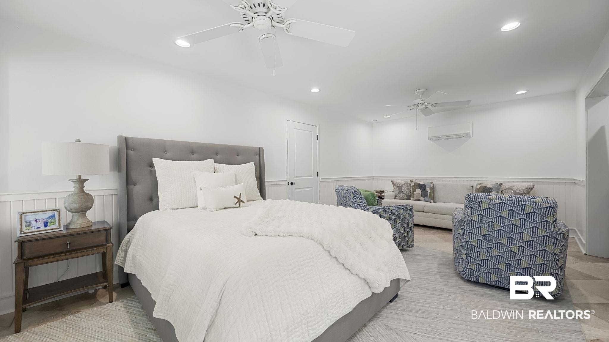 30194 River Road Orange Beach, AL 36561 - Photo 27 of 45 Bedroom featuring a wainscoted wall, a ceiling fan, recessed lighting, and wooden walls