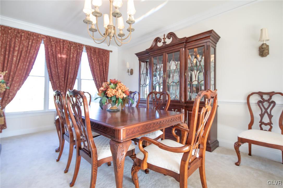 580 Rockbridge Road Nazareth, PA 18064 - Photo 18 of 30 a dining room with furniture a chandelier and window