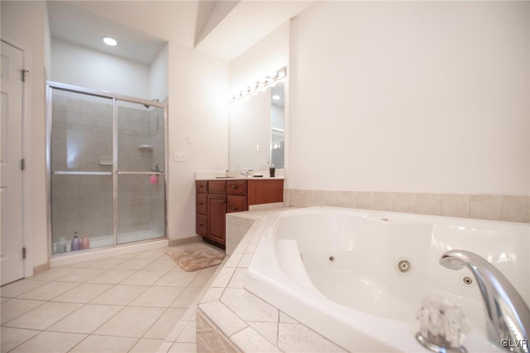 580 Rockbridge Road Nazareth, PA 18064 - Photo 24 of 30 a bathroom with a bathtub and a shower