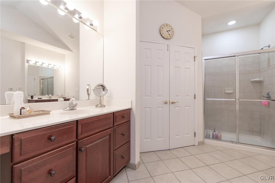 580 Rockbridge Road Nazareth, PA 18064 - Photo 28 of 30 a spacious bathroom with a shower sink and mirror