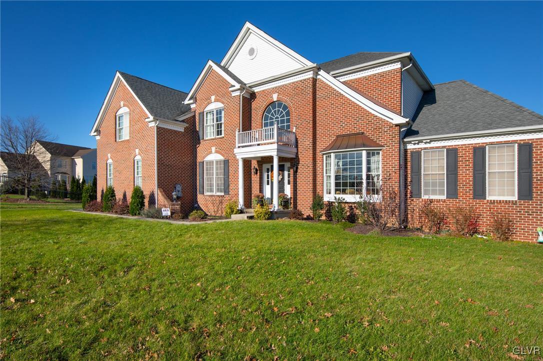 580 Rockbridge Road Nazareth, PA 18064 - Photo 3 of 30 a front view of a house with a yard and garage