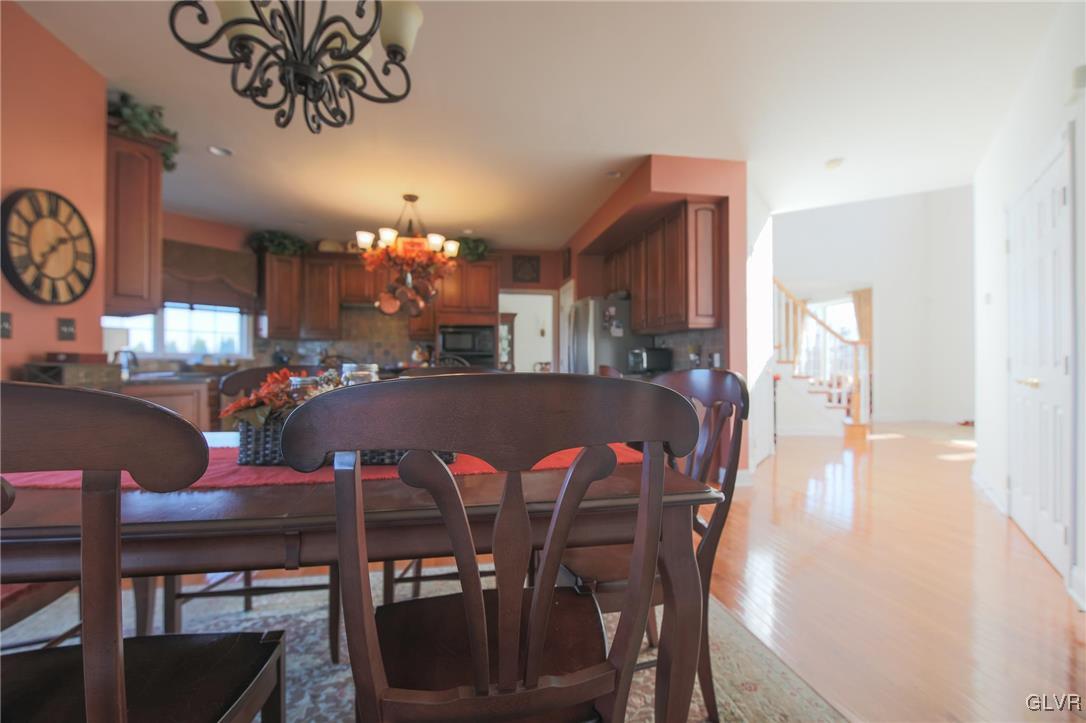580 Rockbridge Road Nazareth, PA 18064 - Photo 10 of 30 a view of a dining room with furniture and chandelier